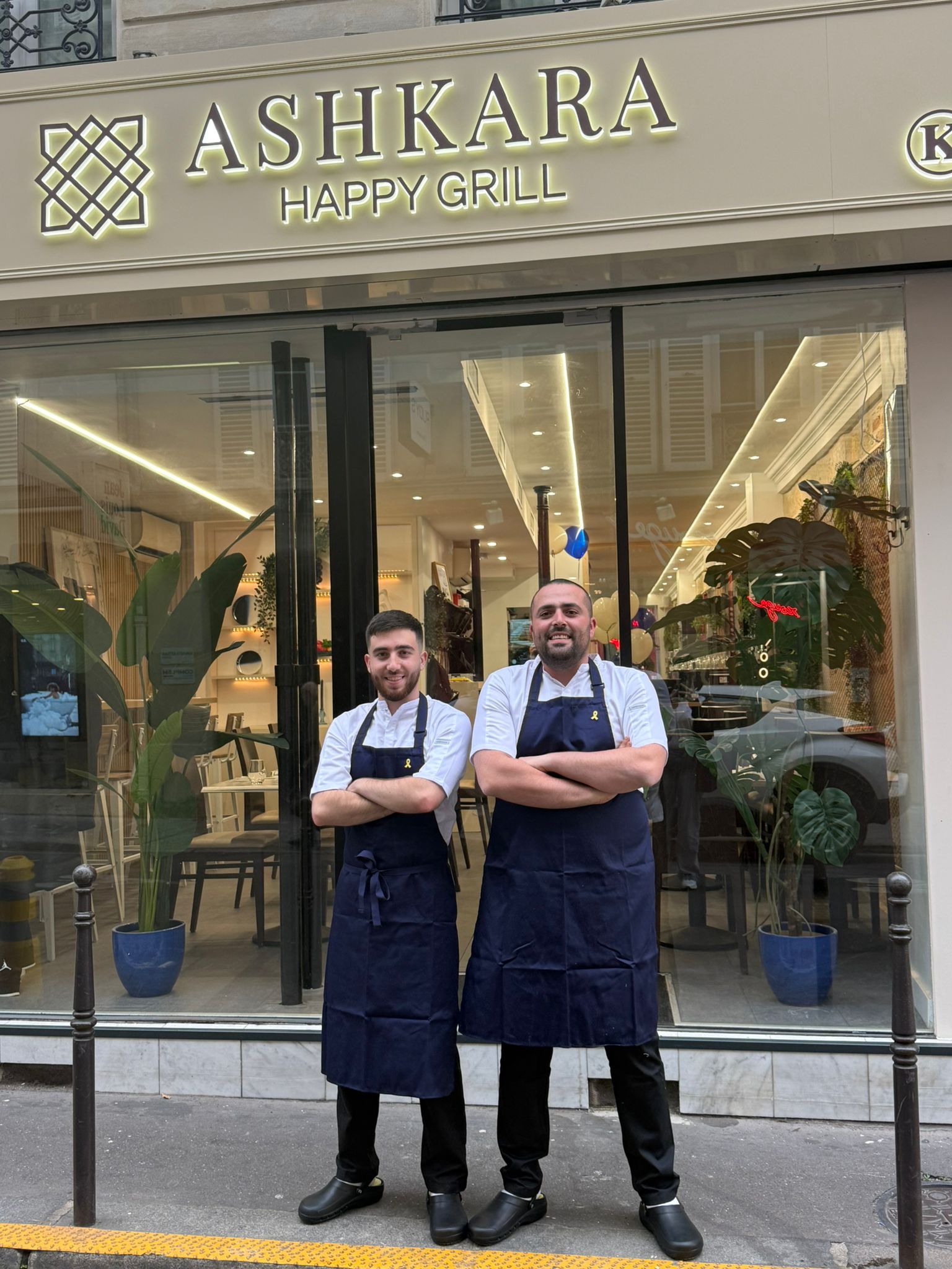 A cozy corner of a restaurant with comfortable seating.